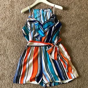 JLo rompers. Crisp summer colors!